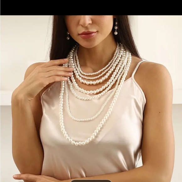 Ivory multi-strand faux pearl necklace and earring set with a - Picture 1 of 8